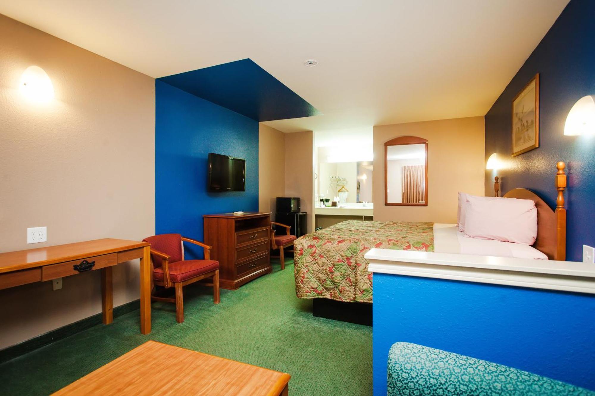 Scottish Inn & Suites Hankamer Værelse billede