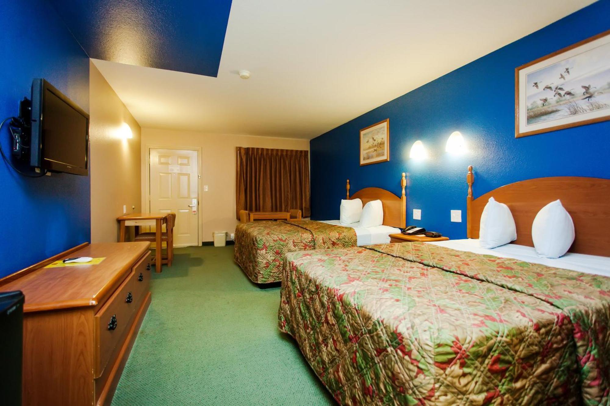 Scottish Inn & Suites Hankamer Værelse billede