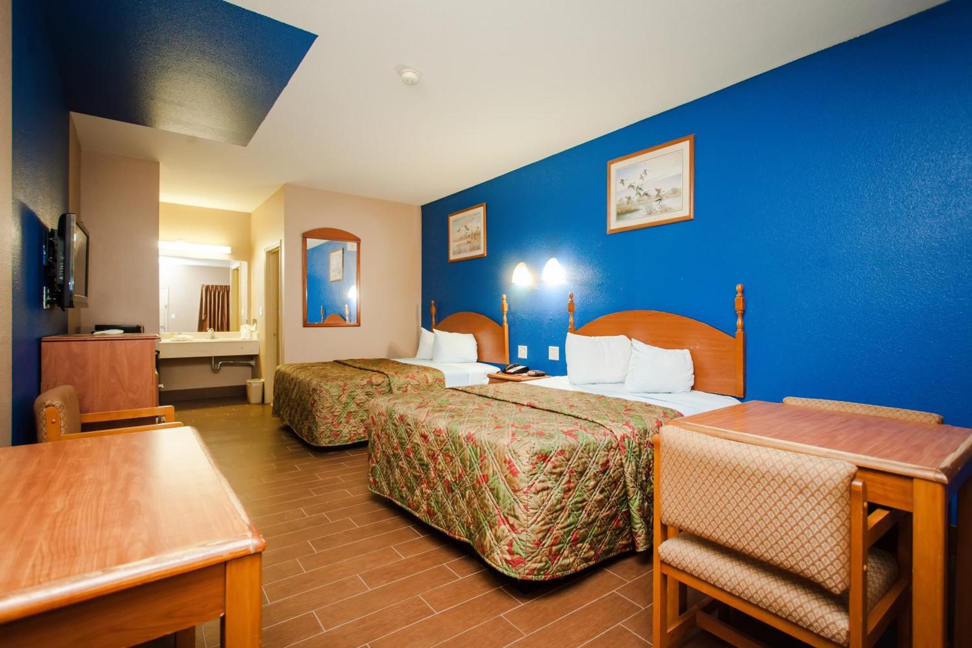 Scottish Inn & Suites Hankamer Værelse billede